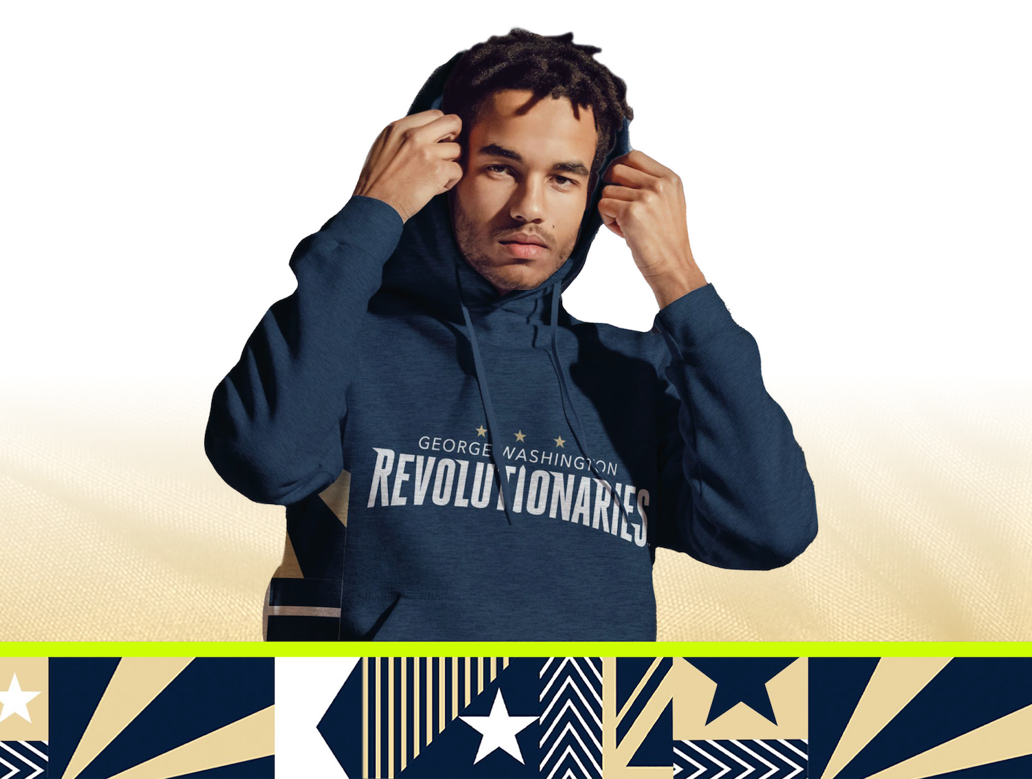 A man wears a GW Revolutionaries sweatshirt